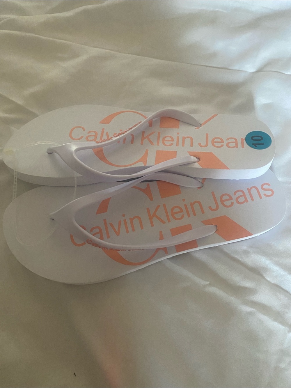 Calvin Klein Jeans White Flip Flops with Peach Logo size 10